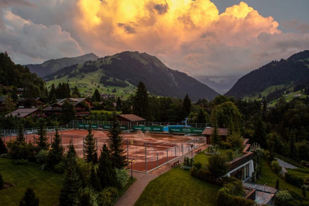 As Roy Emerson Tennis Weeks Continue at Gstaad Palace, the Legend is Awarded the Golden Badge of Honor by Swiss Tennis