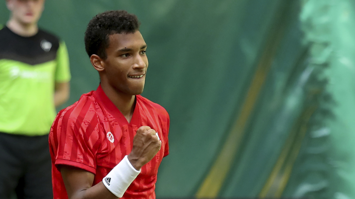 Auger-Aliassime Defeats Federer in Halle; Cilic Advances at Queen’s Club